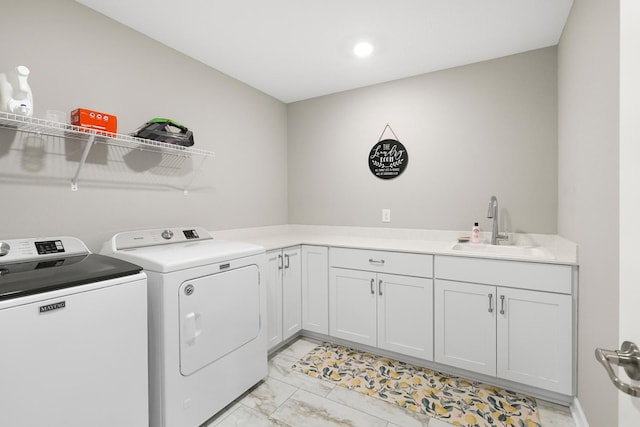 13404 Avila Ave, Rosemount, MN 55068 - laundry area featuring separate washer and dryer, light marble finish flooring, cabinet space, and recessed lighting