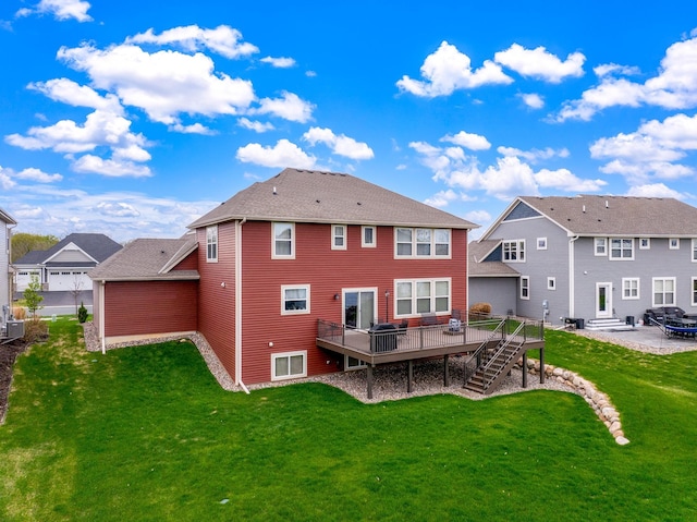 13404 Avila Ave, Rosemount, MN 55068 - back of house featuring a lawn, stairway, a wooden deck, a residential view, and a patio area