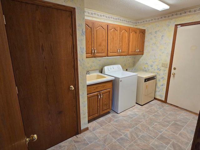735 10th Ave S, Waite Park, MN 56387 - laundry area with cabinet space, washer and dryer, wallpapered walls, baseboards, and a textured ceiling