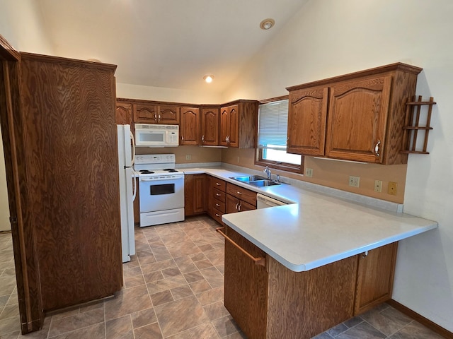 735 10th Ave S, Waite Park, MN 56387 - kitchen featuring white appliances, a sink, a peninsula, vaulted ceiling, and light countertops