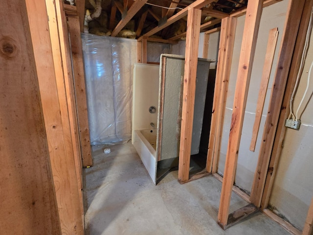 735 10th Ave S, Waite Park, MN 56387 - bathroom featuring unfinished concrete floors