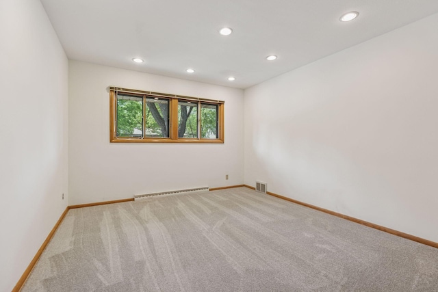 5212 Colonial Dr, Golden Valley, MN 55416 - unfurnished room featuring baseboard heating, carpet floors, recessed lighting, and baseboards