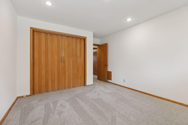 5212 Colonial Dr, Golden Valley, MN 55416 - unfurnished bedroom with carpet floors, recessed lighting, a closet, and baseboards