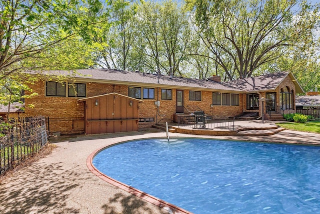5212 Colonial Dr, Golden Valley, MN 55416 - view of swimming pool with a patio and grilling area