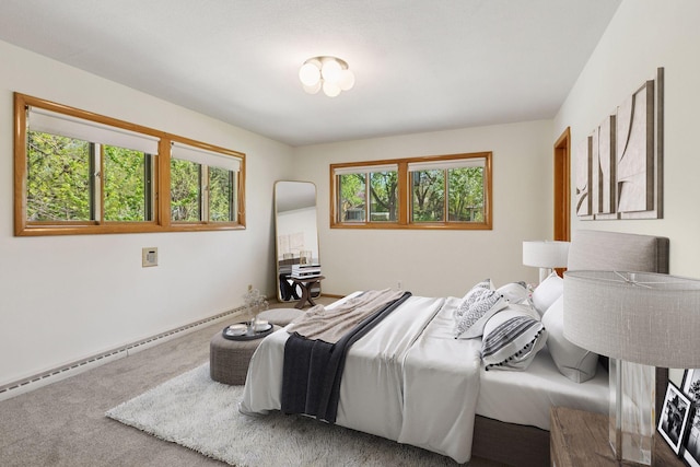 5212 Colonial Dr, Golden Valley, MN 55416 - bedroom featuring a baseboard radiator, carpet floors, and baseboards