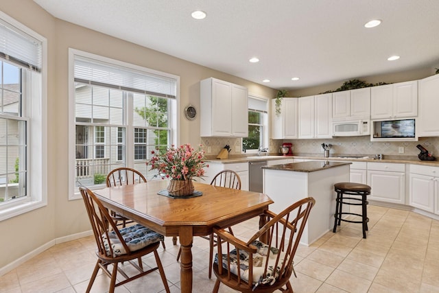17462 Haralson Dr, Eden Prairie, MN 55347 - dining area featuring recessed lighting and light tile patterned floors