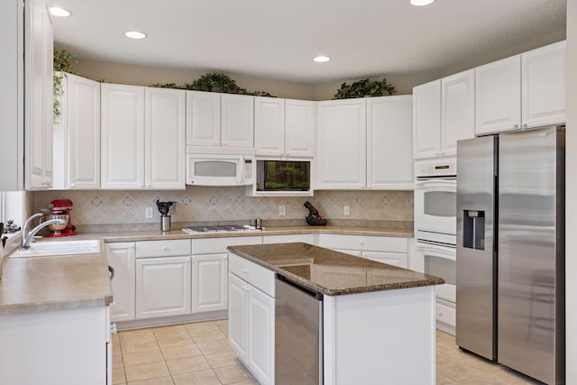 17462 Haralson Dr, Eden Prairie, MN 55347 - kitchen featuring white appliances, wine cooler, light tile patterned flooring, white cabinetry, and decorative backsplash