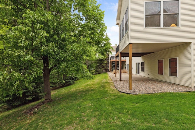 17462 Haralson Dr, Eden Prairie, MN 55347 - view of grassy yard featuring a patio area