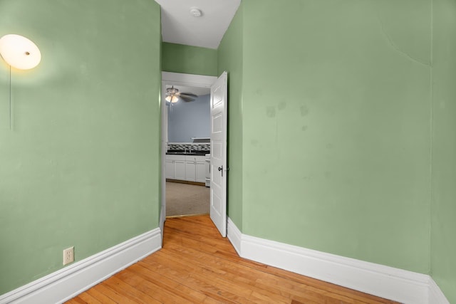 822 35th St, Minneapolis, MN 55408 - empty room featuring baseboards, a smoke detector, light wood-style flooring, and a ceiling fan