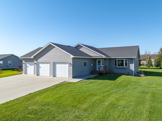 ranch-style home featuring an attached garage, a front lawn, concrete driveway, and roof with shingles