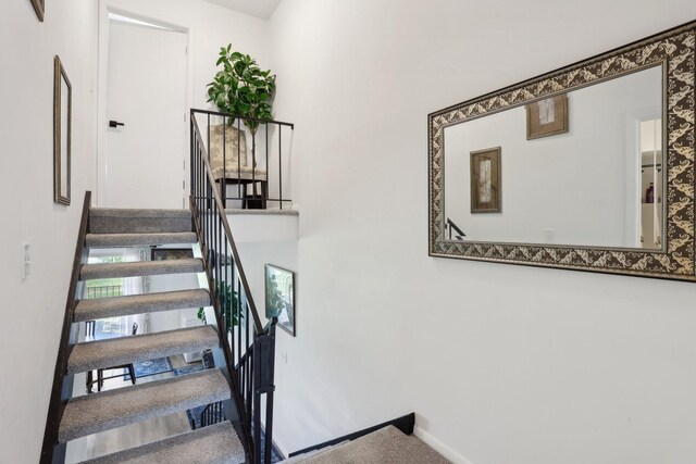 5624 Brookdale Dr N, Brooklyn Park, MN 55443 - staircase with baseboards