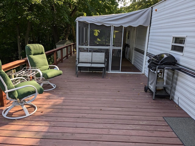 2221 Reubens Ln SW Unit 46, Farwell, MN 56327 - wooden terrace featuring a sunroom