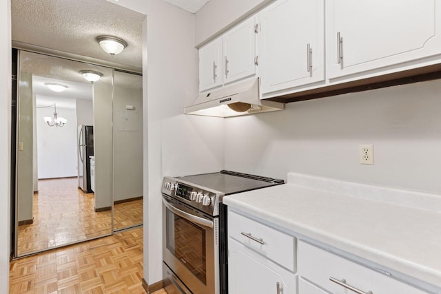450 Ford Rd Unit 231, Saint Louis Park, MN 55426 - kitchen with stainless steel appliances, under cabinet range hood, white cabinetry, a chandelier, and light countertops