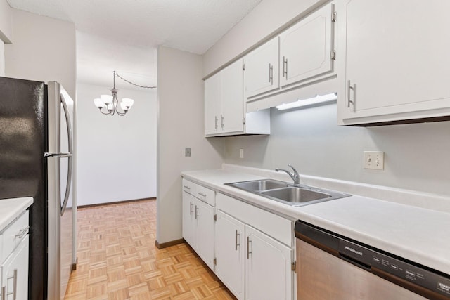 450 Ford Rd Unit 231, Saint Louis Park, MN 55426 - kitchen featuring stainless steel appliances, a sink, white cabinetry, and light countertops