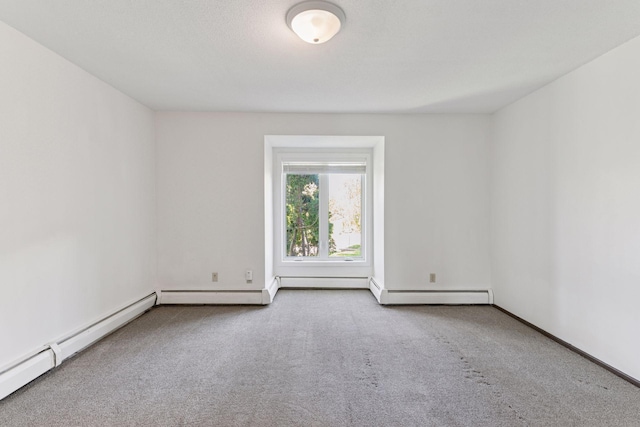 450 Ford Rd Unit 231, Saint Louis Park, MN 55426 - carpeted spare room featuring a baseboard heating unit and baseboards