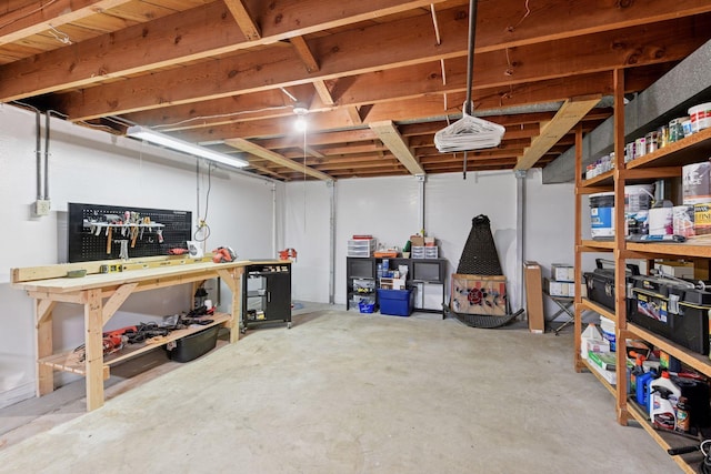 550 Wheeler Dr, Excelsior, MN 55331 - unfinished basement with a workshop area
