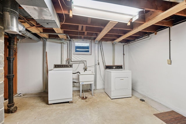 550 Wheeler Dr, Excelsior, MN 55331 - unfinished basement featuring separate washer and dryer and a sink