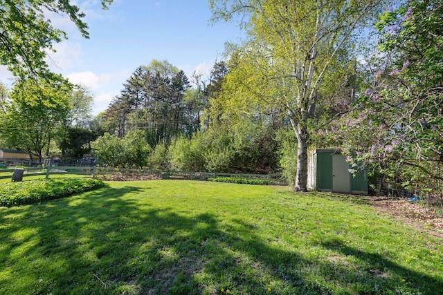 550 Wheeler Dr, Excelsior, MN 55331 - view of yard with a shed and an outbuilding
