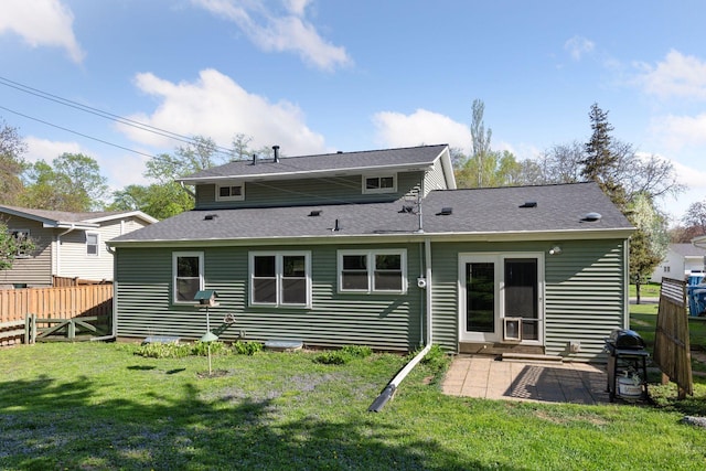 550 Wheeler Dr, Excelsior, MN 55331 - back of house featuring a patio area and roof with shingles