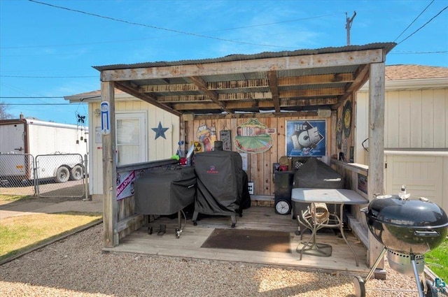 view of outdoor structure featuring fence