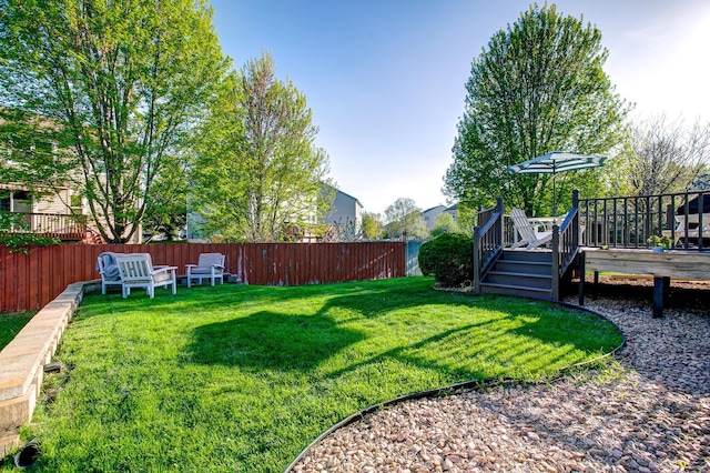 view of yard with a wooden deck