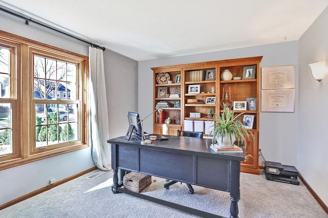 office with carpet floors and baseboards