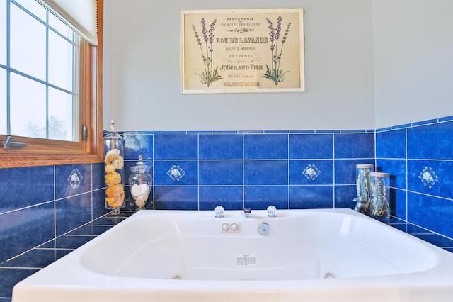 bathroom featuring a jetted tub
