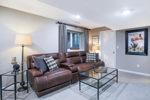 carpeted living room featuring baseboards