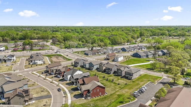 aerial view of residential area with a forest