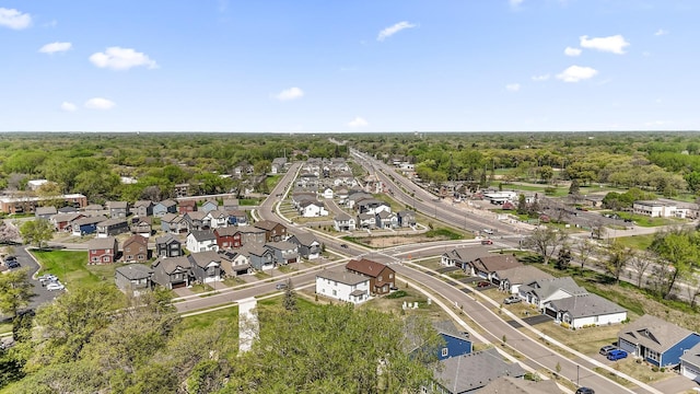 aerial perspective of suburban area with a forest