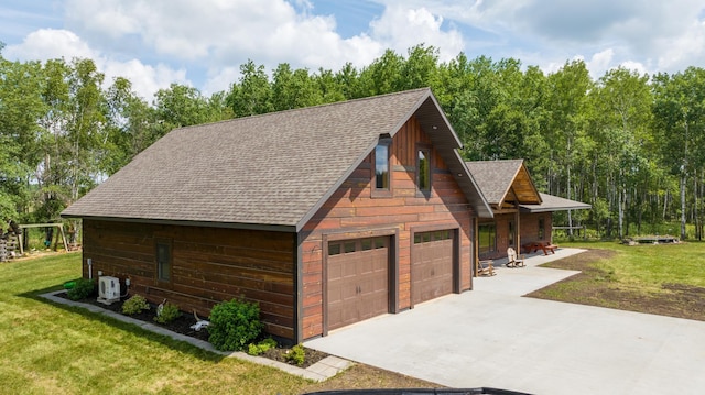 garage with covered porch and concrete driveway