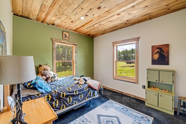 bedroom featuring wood ceiling, multiple windows, dark carpet, and recessed lighting