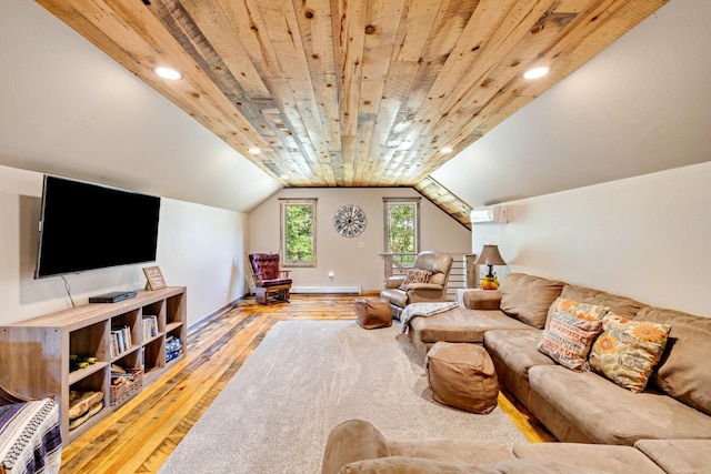 living room with hardwood / wood-style floors, recessed lighting, vaulted ceiling, baseboards, and baseboard heating