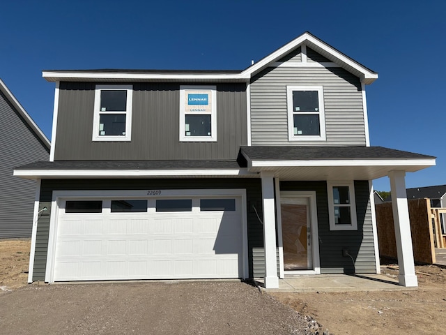 22609 Isla Way, Rogers, MN 55374 - view of front of property featuring an attached garage and driveway