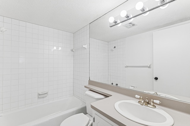 full bathroom featuring a textured ceiling, toilet, vanity, and shower / tub combination