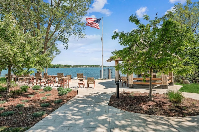 view of property's community with a water view