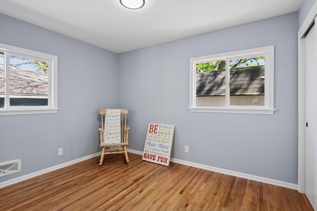 3544 Lee Ave N, Crystal, MN 55422 - living area featuring wood finished floors and baseboards