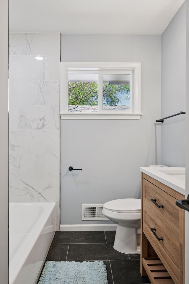 3544 Lee Ave N, Crystal, MN 55422 - bathroom featuring toilet, vanity, and tile patterned flooring