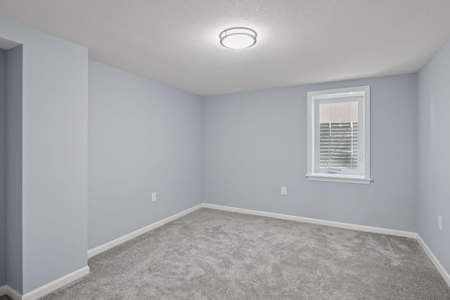 3544 Lee Ave N, Crystal, MN 55422 - carpeted empty room featuring baseboards and a textured ceiling