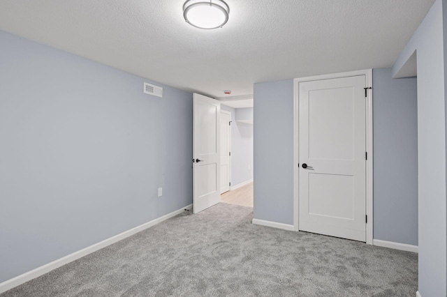 3544 Lee Ave N, Crystal, MN 55422 - carpeted empty room with a textured ceiling and baseboards