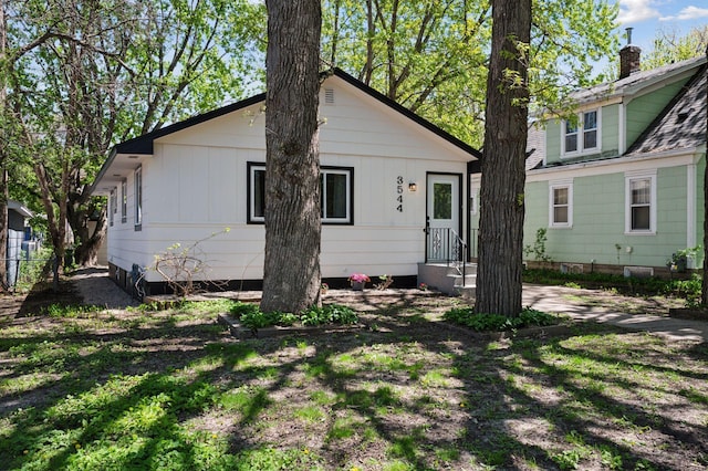 3544 Lee Ave N, Crystal, MN 55422 - back of house with a chimney