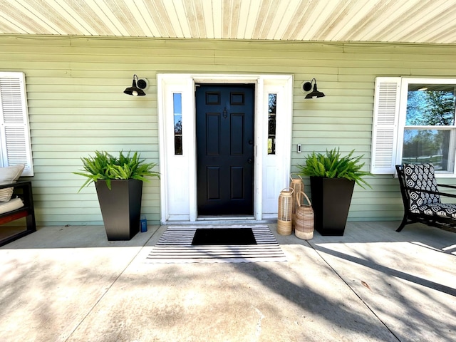 1921 Sherman Dr NW, Alexandria, MN 56308 - view of exterior entry with a porch