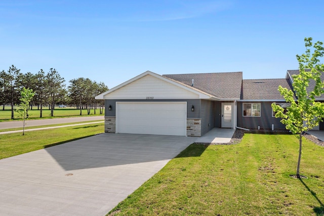 38760 Maple Ct, North Branch, MN 55056 - single story home with a garage, driveway, a front lawn, roof with shingles, and stone siding