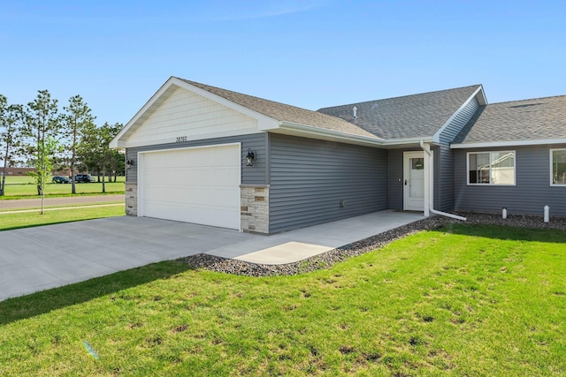 38760 Maple Ct, North Branch, MN 55056 - view of front of property with a garage, a front lawn, driveway, and a shingled roof