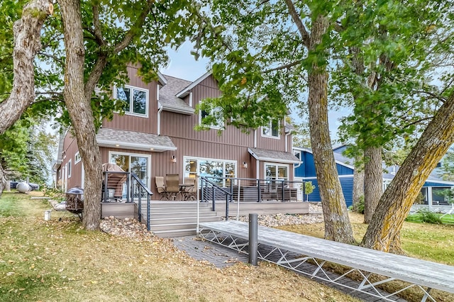 26533 Paradise Point Rd, Detroit Lakes, MN 56501 - back of house with a shingled roof and a deck