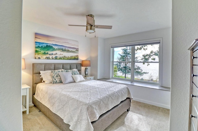 26533 Paradise Point Rd, Detroit Lakes, MN 56501 - carpeted bedroom with baseboards and a ceiling fan