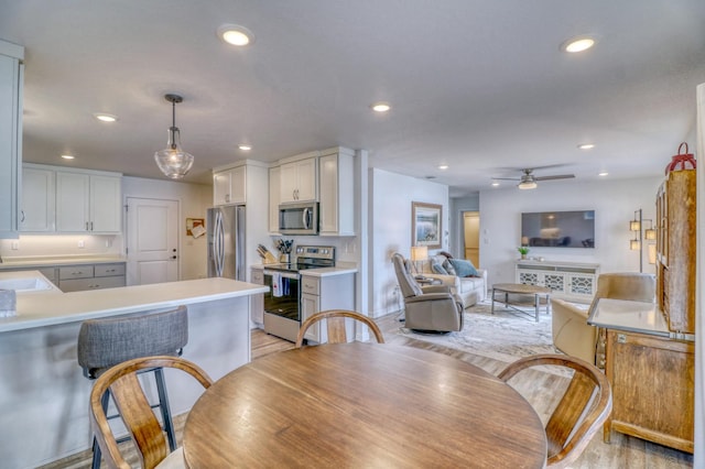 26533 Paradise Point Rd, Detroit Lakes, MN 56501 - dining room featuring light wood finished floors, recessed lighting, and a ceiling fan