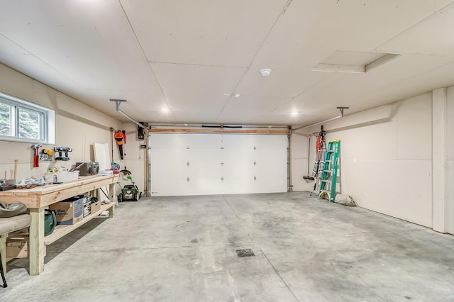 26533 Paradise Point Rd, Detroit Lakes, MN 56501 - garage featuring a workshop area