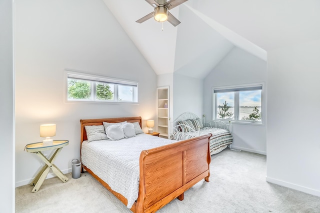 26533 Paradise Point Rd, Detroit Lakes, MN 56501 - bedroom with light carpet, baseboards, vaulted ceiling, and a ceiling fan