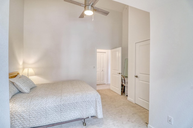 26533 Paradise Point Rd, Detroit Lakes, MN 56501 - bedroom featuring light colored carpet, a towering ceiling, baseboards, and a ceiling fan